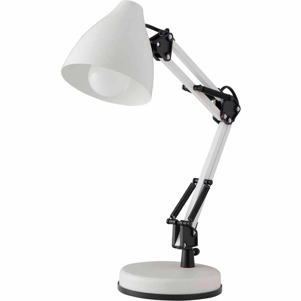Wilko White Angle Task Lamp Our angle task lamp is just the thing to help you see what you're doing whether you're at your desk or your sewing bench! With the adjustable arm and head, you can easily position the light just where you need it. And the neutral white colour will complement a variety of decor styles too. Requires screw E27/ES light bulb. Use LED bulb only. Max LED 6W. Care and use: Suitable for indoor use only. Clean with a soft dry cloth. Warning: Always read packaging before use. All sizes are approximate.