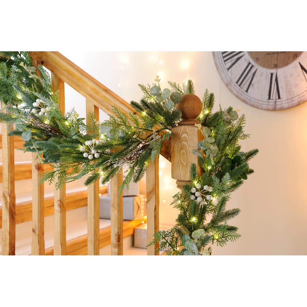 Festive Warm White LED Natural Styled Eucalyptus Snow Flocked Christmas Garland 270cm Image 2