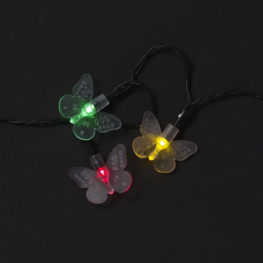 Wilko 50 pack Butterfly LED Garden Solar Lights Create stunning displays in your garden with our set of 50 butterfly solar string lights. The butterflies have assorted colour LED lights to create a rainbow of colour. The butterflies are joined together by a discreet, green wire to easily blend into your surroundings. These solar string lights would look great draped over a hedge, across your fence or around a tree. There's no wiring required, simply place the solar panel in a position of direct sunlight. During the day the panel will charge with solar energy and automatically illuminate your butterflies when it's dark. Overall cable length: 5.9m. Includes 1x AA rechargeable battery.