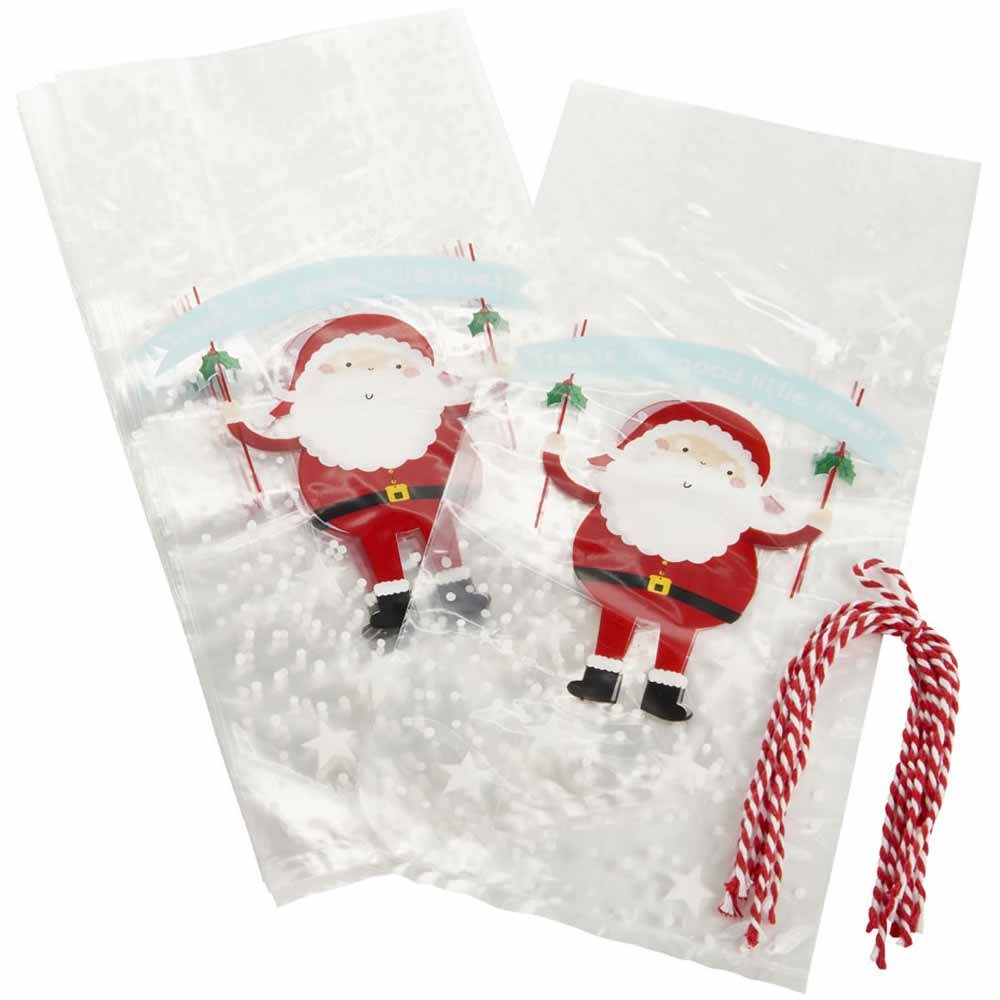 Wilko 8 Pack Kids Cellophane Santa Treat Bags with String Image 2