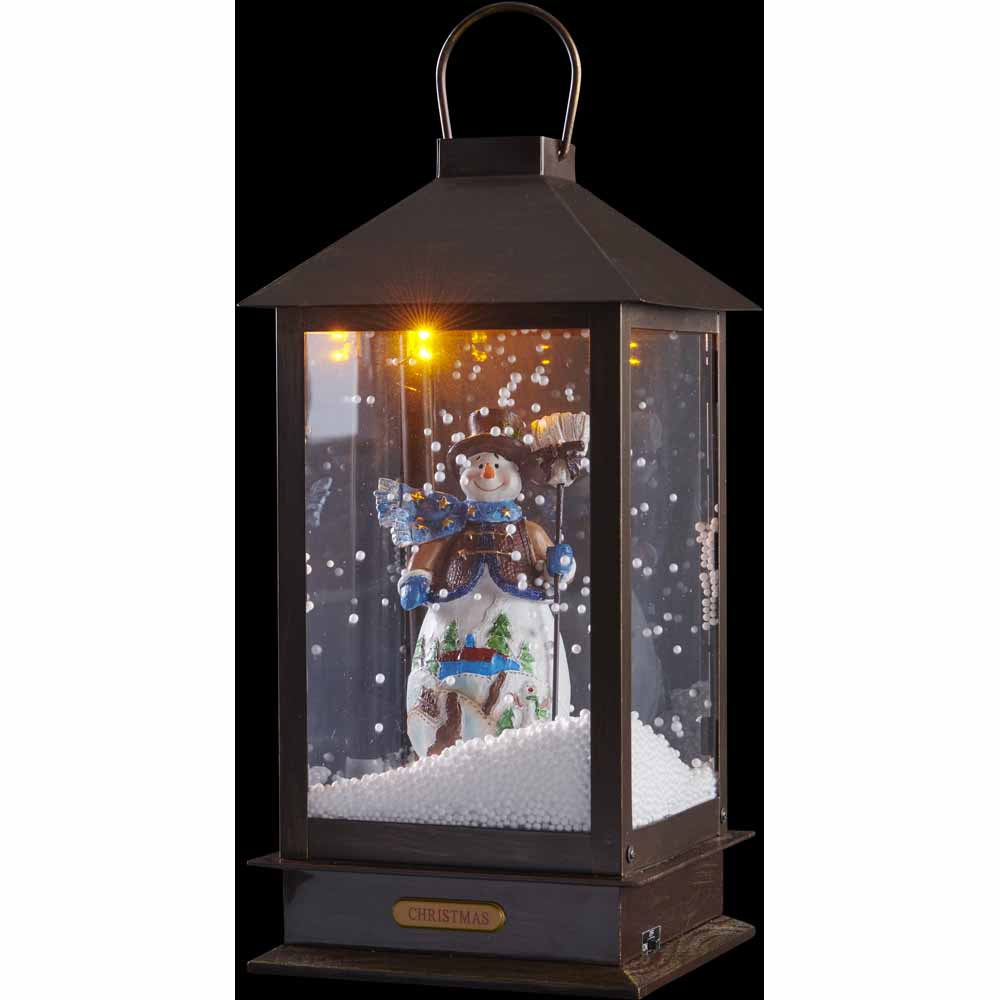 Wilko Musical Battery Operated Snowing Lantern with Snowman Image 1