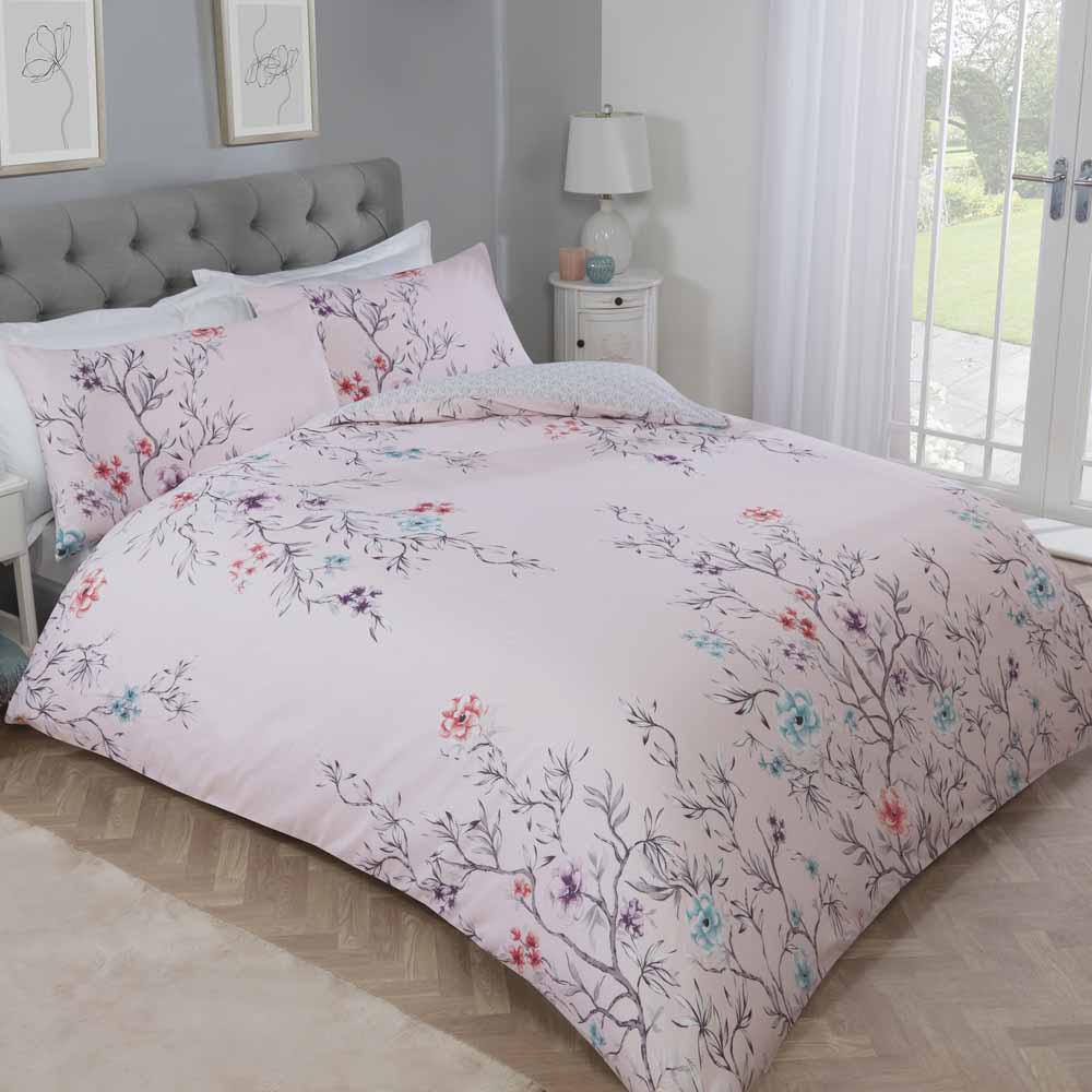 Sleepdown Oriental Duvet Set Single  - wilko Make your bed look stylish and sophisticated with this awesome Oriental Duvet Set by Sleepdow. The set includes a standard pillowcase and duvet cover featuring a stylish and fully reversible oriental design in pink that gives your bedroom two looks in one. Their naturally soft, durable and easy-to-care fabric is made from high quality blended polycotton that offers you the perfect nights sleep and retains colour and shape wash after wash. The wash on a cool cycle, quick to dry and cool iron makes laundering perfect for a busy household. If you are looking for something to transform your bedroom, this duvet set for a single bed will do that with style and comfort. Colour: Pink. Size: Single. Dimensions: Pillowcase- 48 x 76cm. Duvet cover- 135 x 200cm. Care and use: Wash at 40 degrees and minimal ironing required.