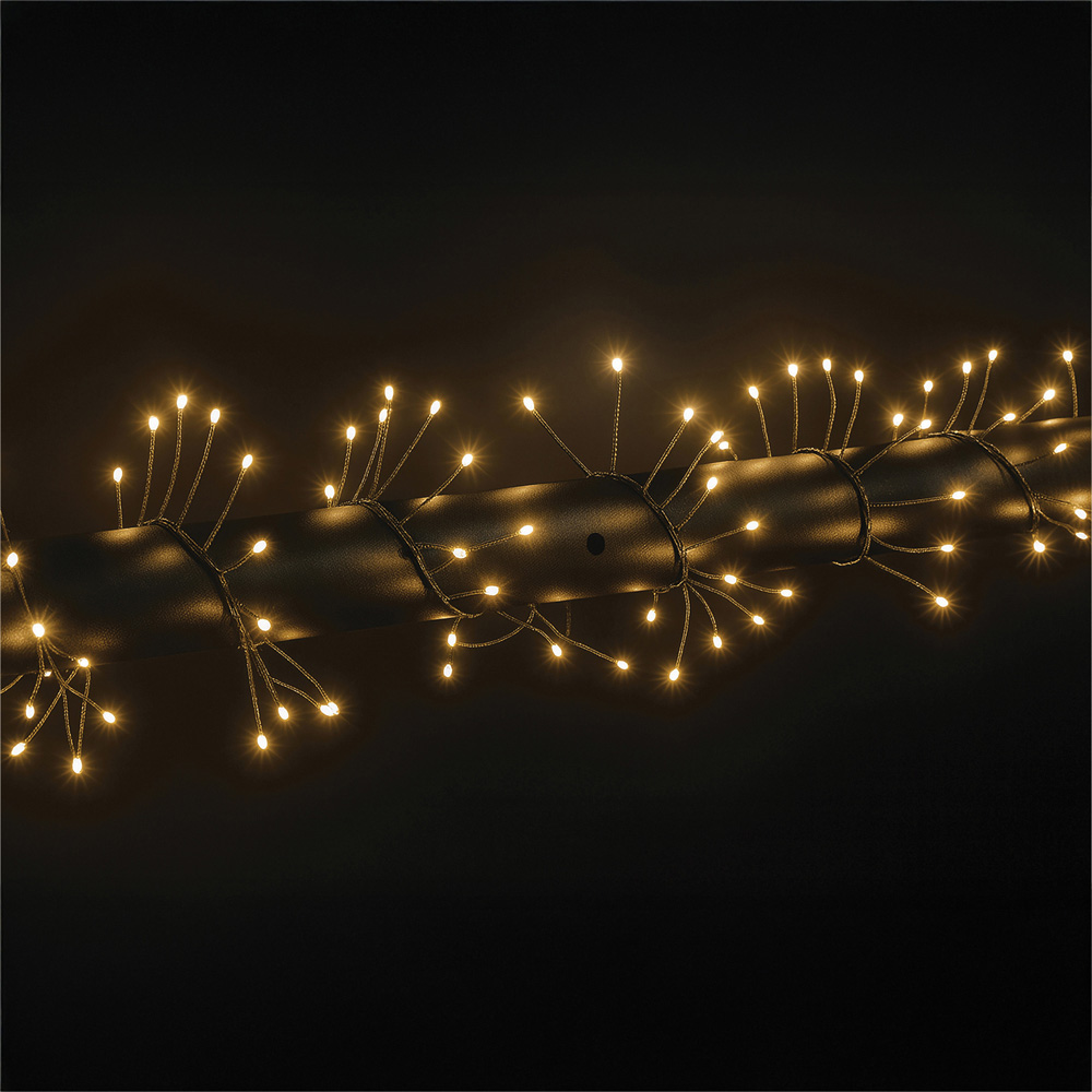 Xmas Haus Warm White Seed LED Multifunction Green Cable Cluster Light 6m Image 1