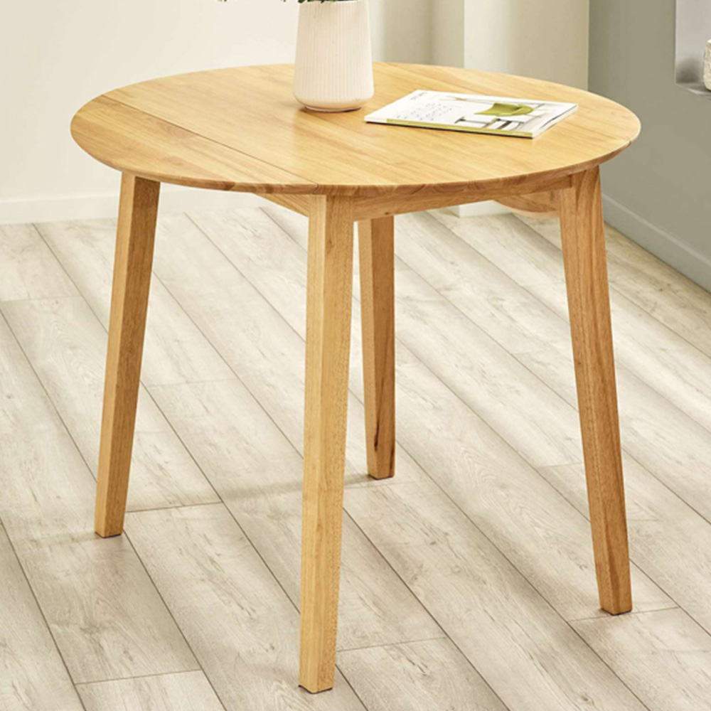 Julian Bowen Coast 4 Seater Oak Effect Round Drop Leaf Dining Table Image 1