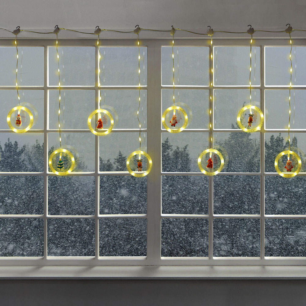 115 LED Christmas Character Curtain Lights - Warm White Image 1