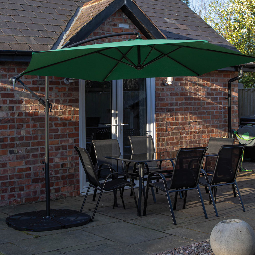 Samuel Alexander 6 Seater Glass Top Outdoor Dining Set with Green Banana Parasol and Base Image 1