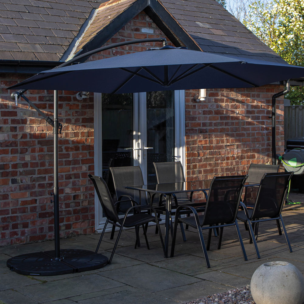 Samuel Alexander 6 Seater Glass Top Outdoor Dining Set with Blue Banana Parasol and Base Image 1