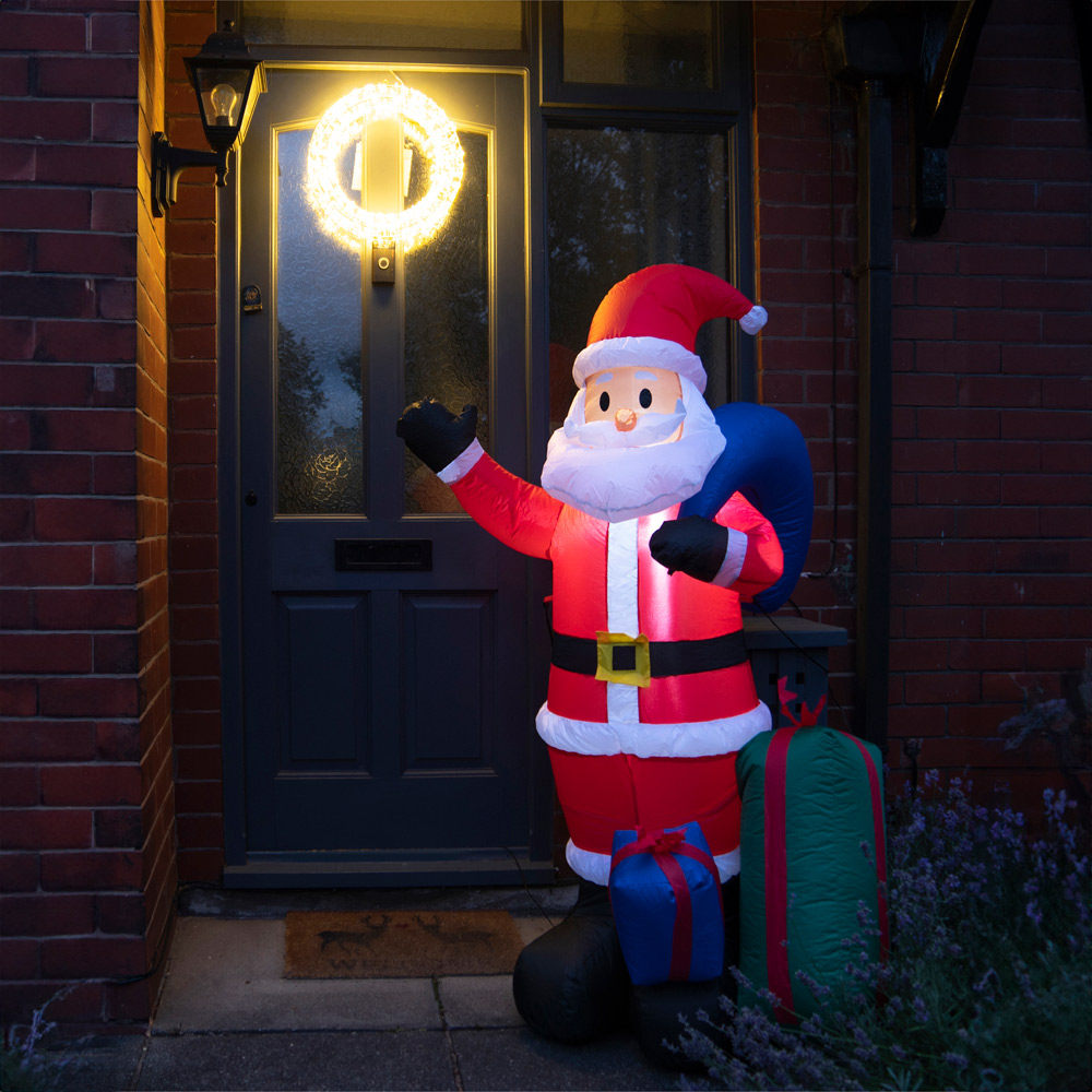 St Helens LED Multicolour Inflatable Santa Claus with Presents 5ft Image 1