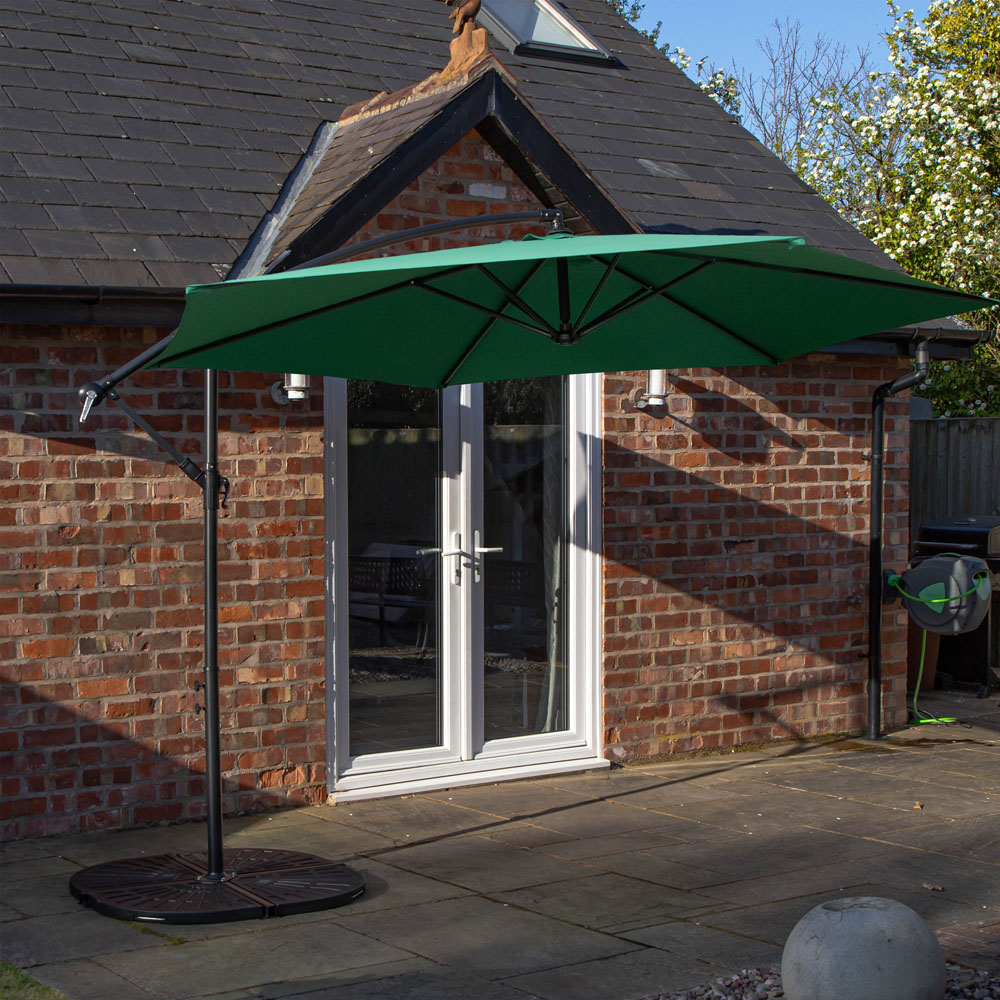 Samuel Alexander 4 Seater Glass Top Stackable Dining Set with Green Banana Parasol and Base Image 7