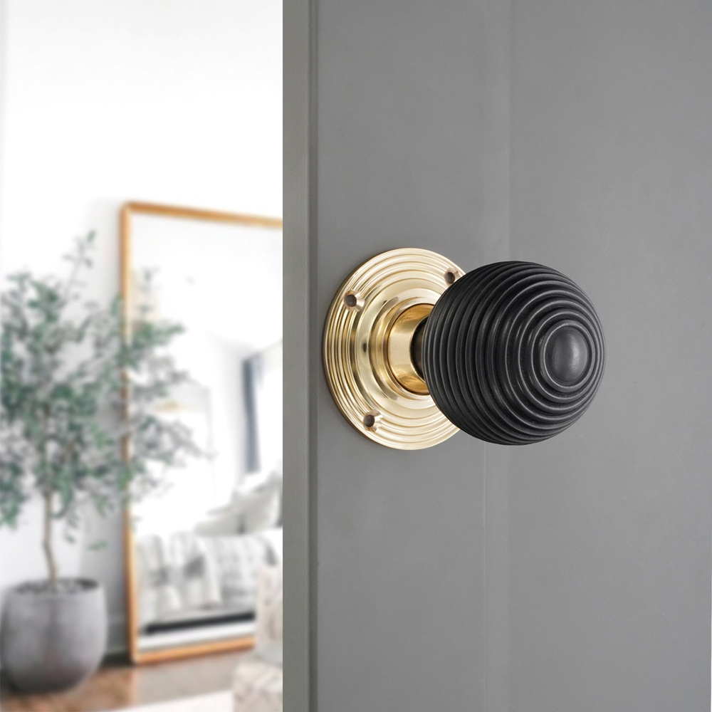 Spira Brass Polished Brass Ebony Beehive Rim and Mortice Door Knob 2 Pack Image 2