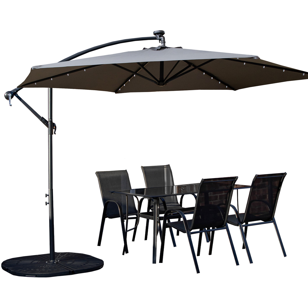Samuel Alexander 4 Seater Glass Top Outdoor Dining Set with Grey Banana Lit Parasol and Base Image 2