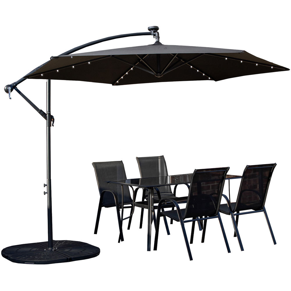 Samuel Alexander 4 Seater Glass Top Outdoor Dining Set with Black Banana Lit Parasol and Base Image 2