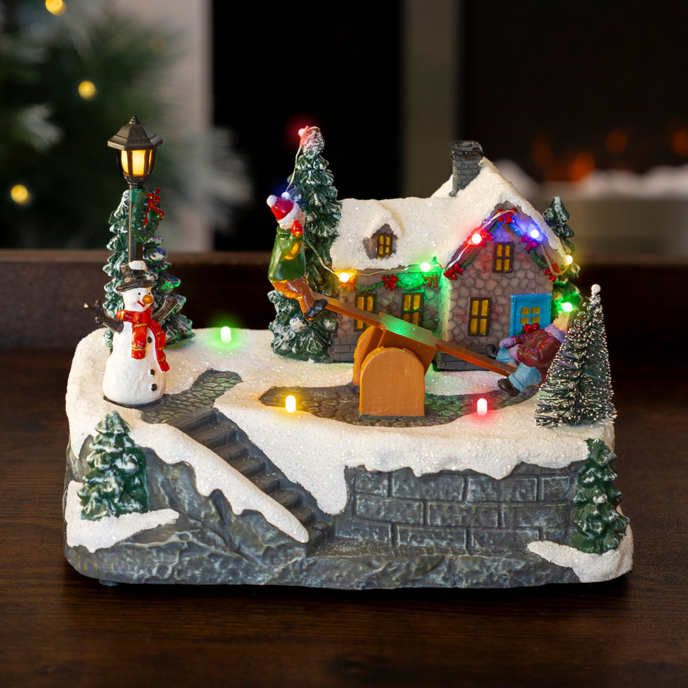 Marco Paul Multicolour LED See Saw Musical Village Scene Christmas Decoration Image 7