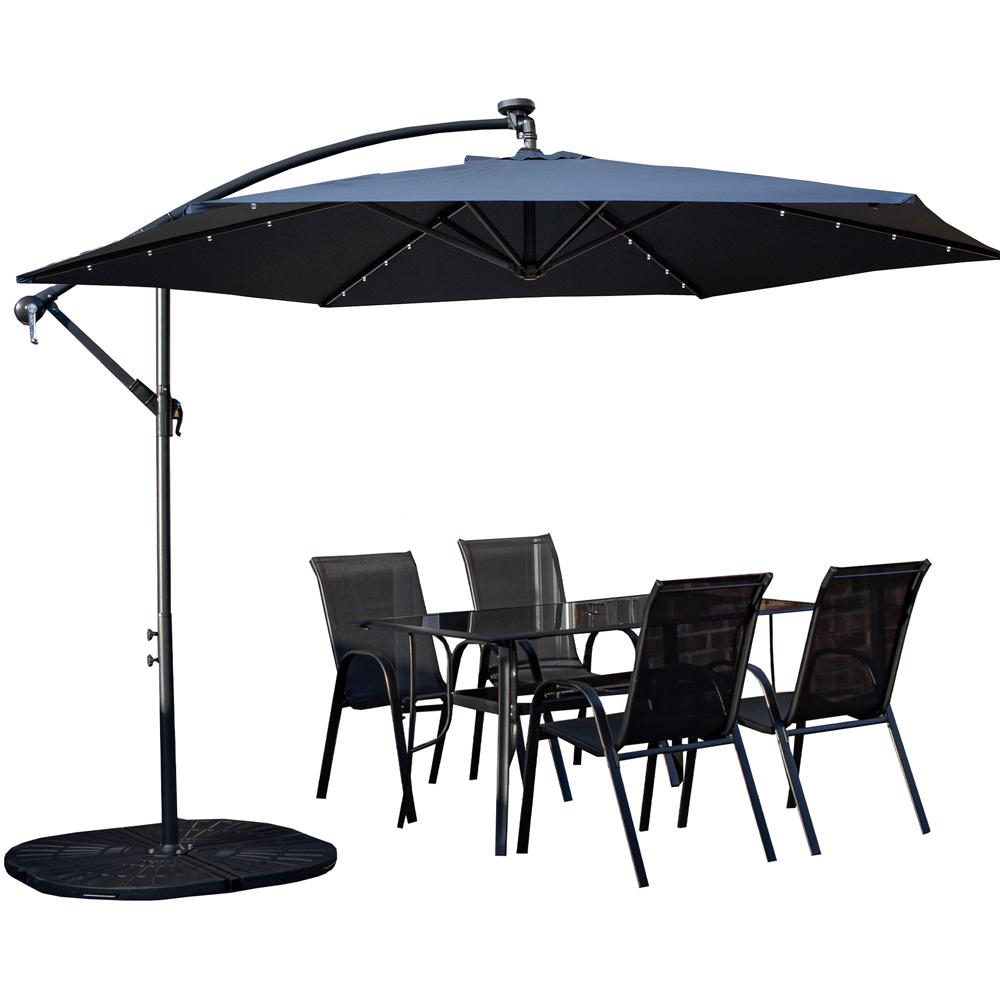 Samuel Alexander 4 Seater Glass Top Outdoor Dining Set with Blue Banana Lit Parasol and Base Image 2