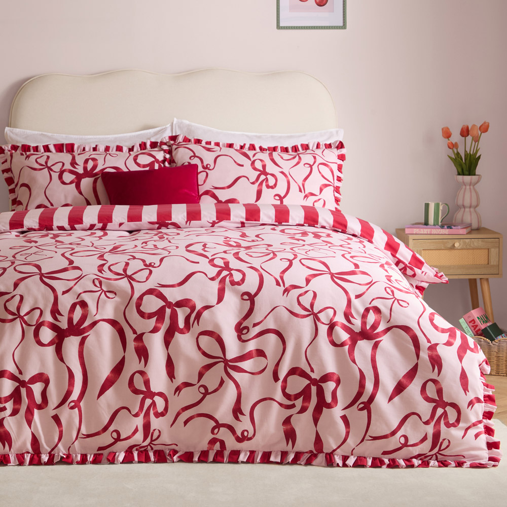 Furn Christmas La Vie En Single Pink and Red Bows Reversible Duvet Cover Set Image 1