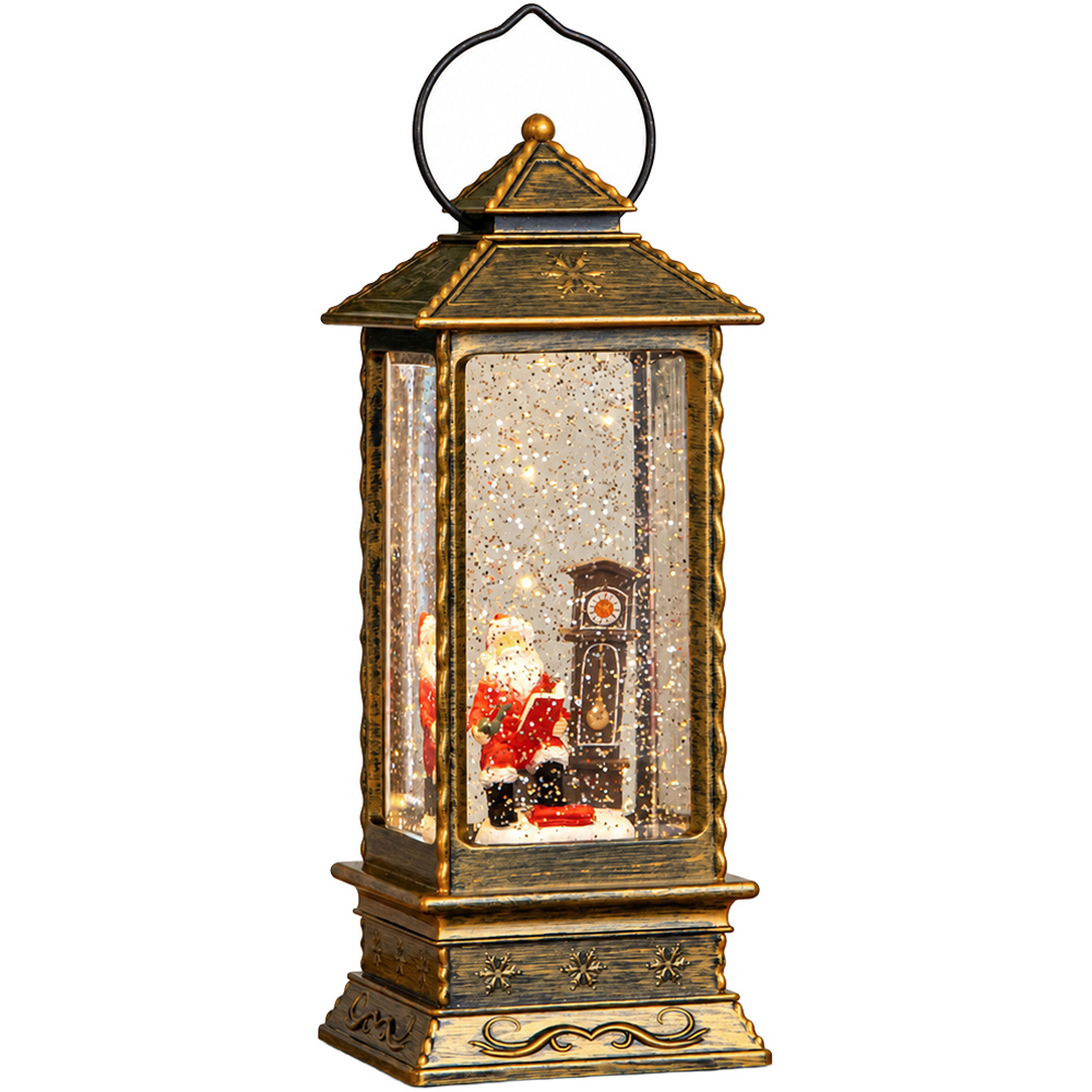 Samuel Alexander Warm White LED Antique Gold Santa and Clock Christmas Water Spinner Lantern 27cm Image 1