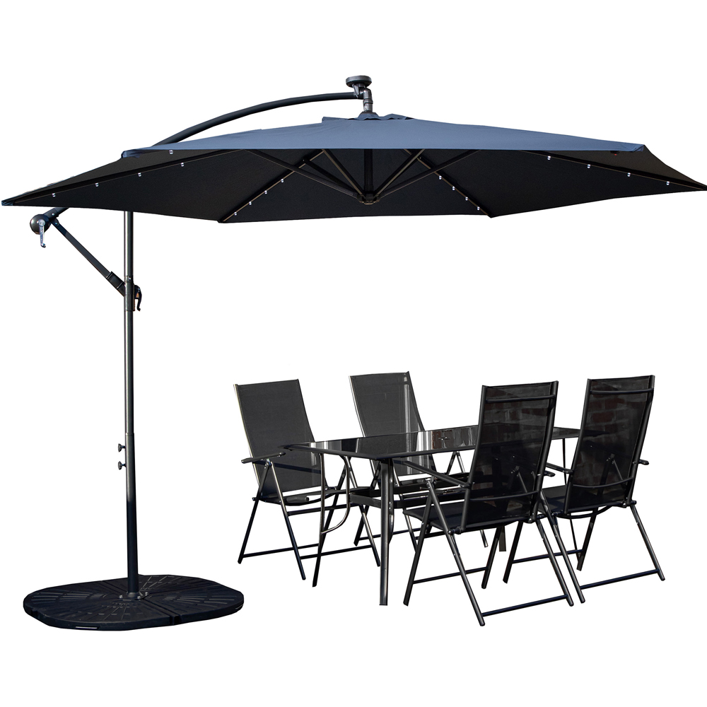 Samuel Alexander 4 Seater Glass Top Outdoor Dining Set with Blue Banana Lit Parasol and Base Image 2