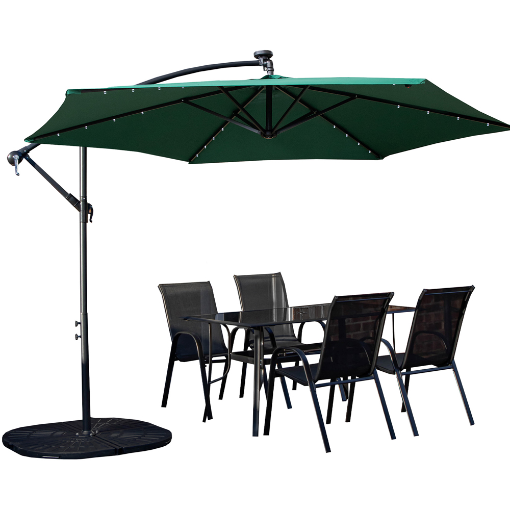 Samuel Alexander 4 Seater Glass Top Outdoor Dining Set with Green Banana Lit Parasol and Base Image 2