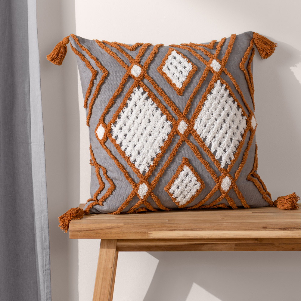 furn. Aquene Charcoal and Brick Tufted Tasselled Cushion Image 2