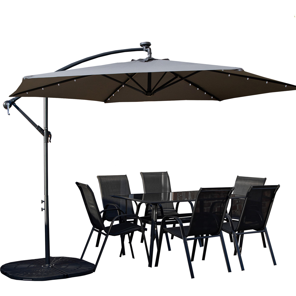 Samuel Alexander 6 Seater Glass Top Outdoor Dining Set with Grey Banana Lit Parasol and Base Image 2