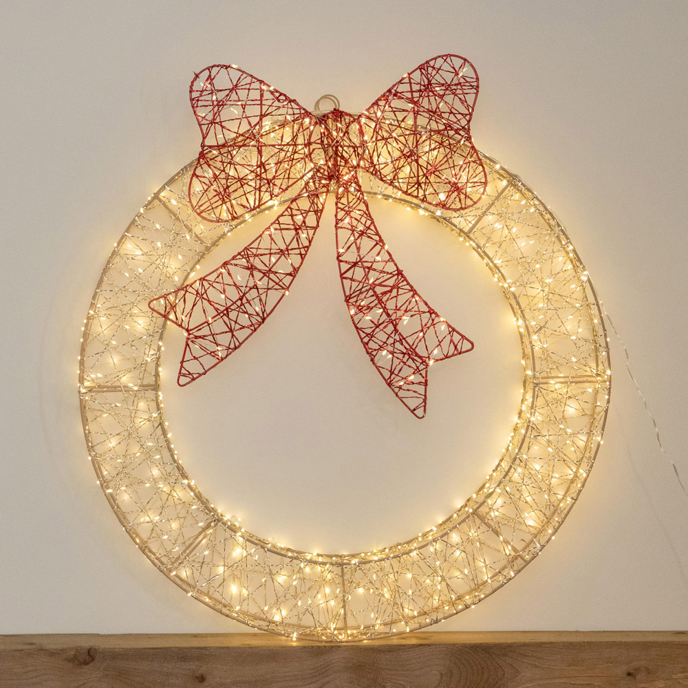 Samuel Alexander 750 Warm White LED Christmas Wreath with Red Bow and Timer 70cm Image 1