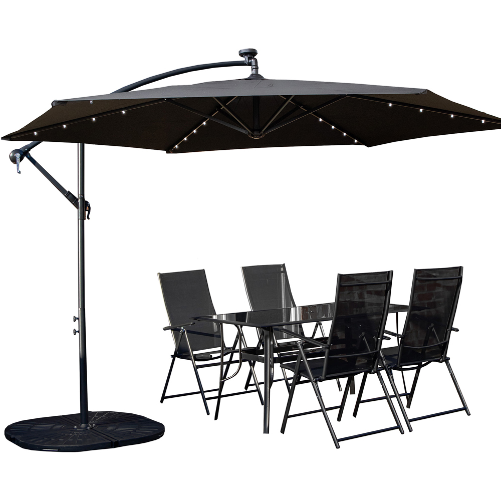 Samuel Alexander 4 Seater Glass Top Outdoor Dining Set with Black Banana Lit Parasol and Base Image 2