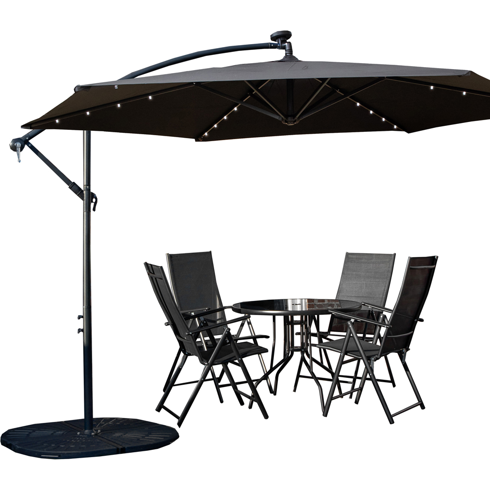 Samuel Alexander 4 Seater Glass Top Foldable Dining Set with Black Banana Lit Parasol and Base Image 2