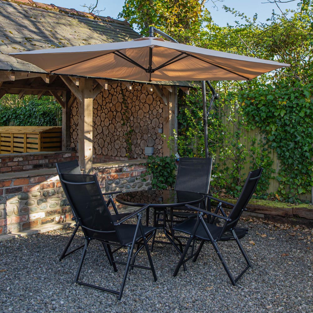 Samuel Alexander 4 Person Round Glass Top Garden Dining Set with Beige Banana Parasol and Base Image 1