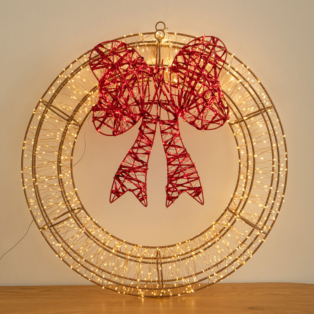 Samuel Alexander 1440 Warm White LED Light-Up Galaxy Christmas Wreath with Bow 50cm Image 1
