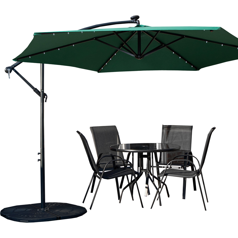 Samuel Alexander 4 Seater Glass Top Stackable Dining Set with Green Banana Lit Parasol and Base Image 2