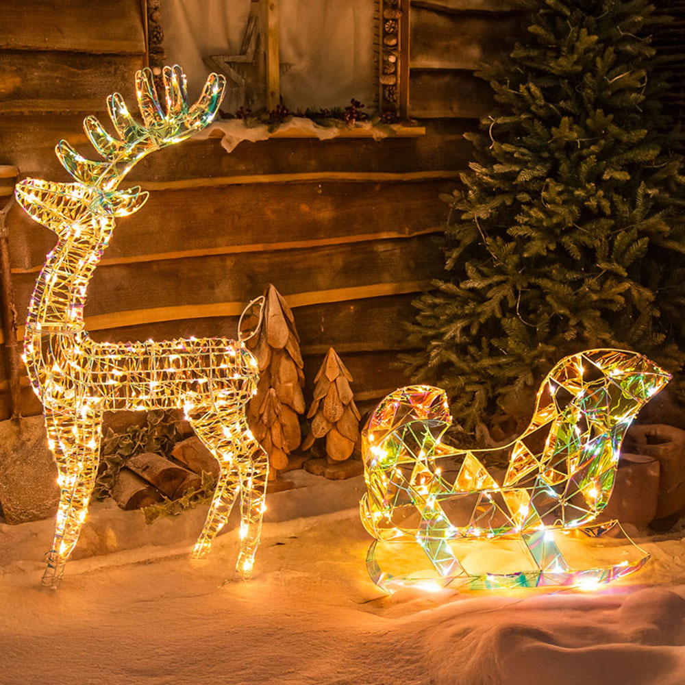 The Christmas Centre 120 LED Pre-Lit Laser Light-Up Reindeer and Sleigh 4ft Image 1
