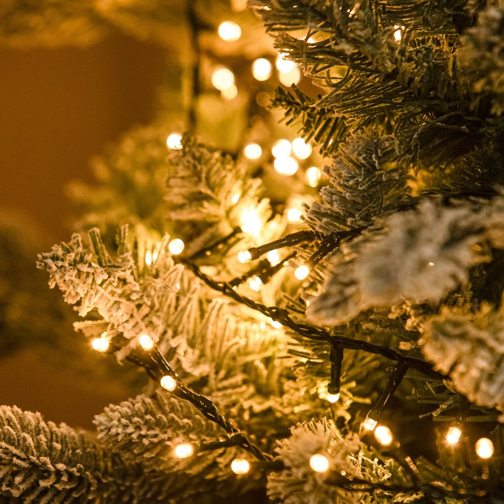 The Christmas Centre 720 Warm White LED Multifunction Green Cable String Light 64m Image 4