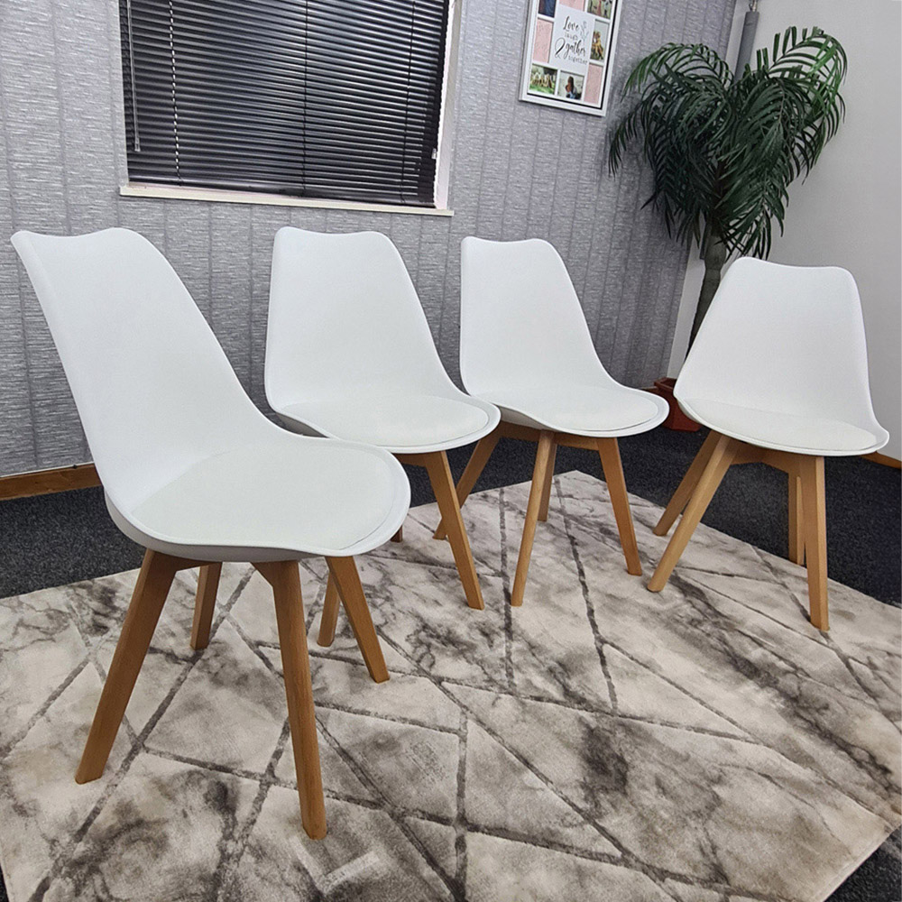 Kosy Koala Set of 4 White Plastic Dining Chair with Faux Leather Padded Seat Image 1