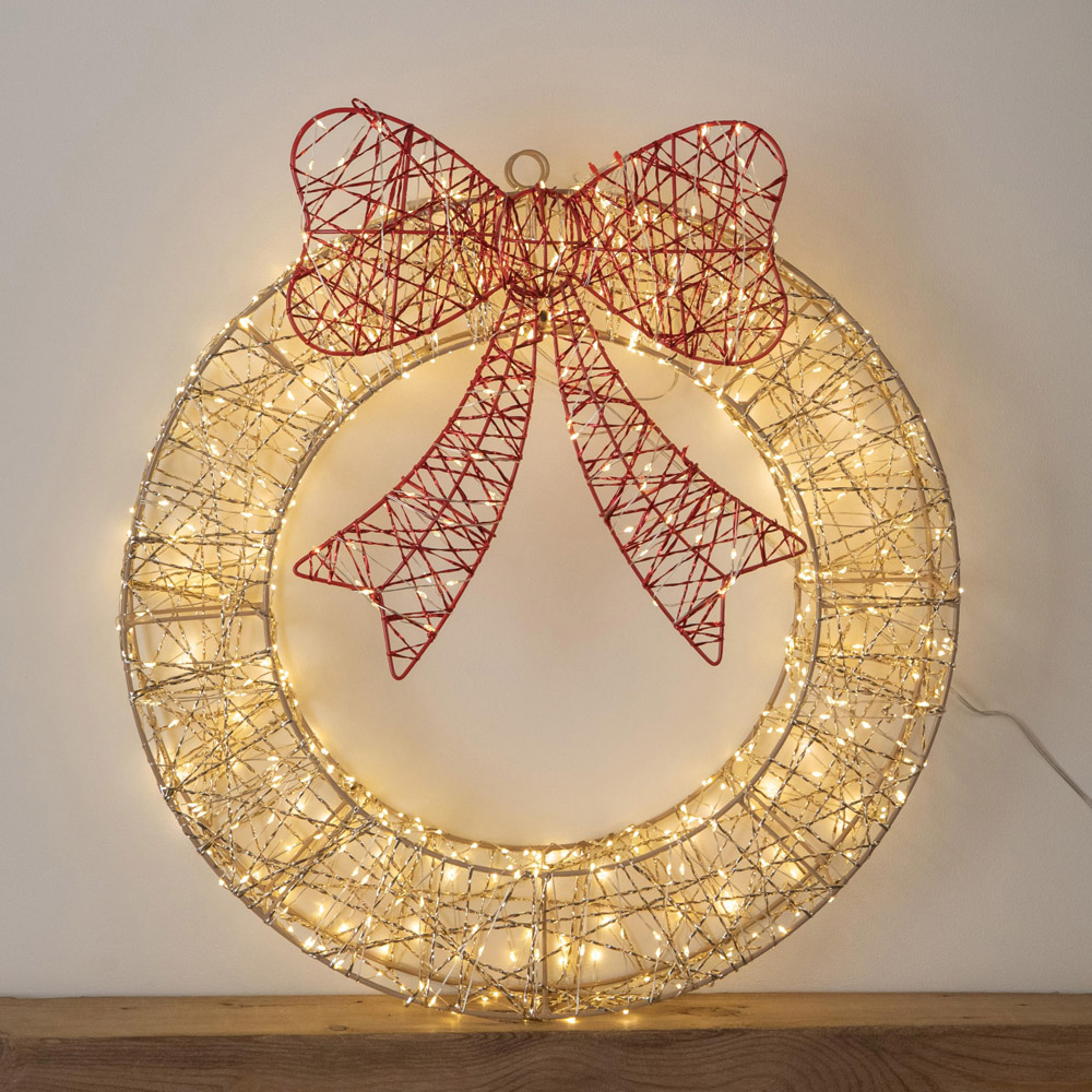Samuel Alexander 600 Warm White LED Gold Christmas Wreath with Red Bow and Timer 50cm Image
