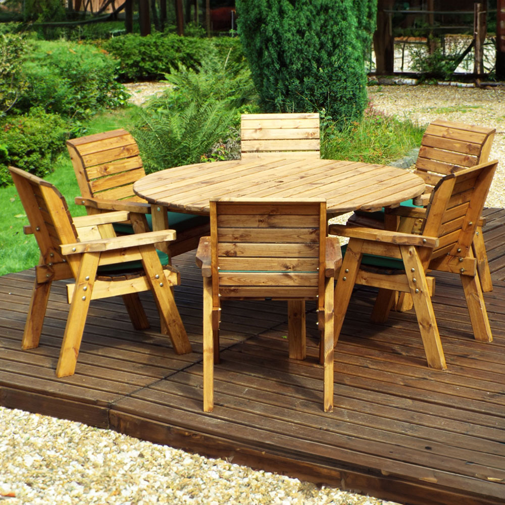 Charles Taylor Solid Wood 6 Seater Round Outdoor Dining Set with Green Cushions Image 1