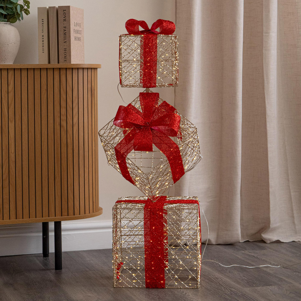 Samuel Alexander 500 Warm White LED Gold Christmas Parcel Stack with Timer 96cm Image 1