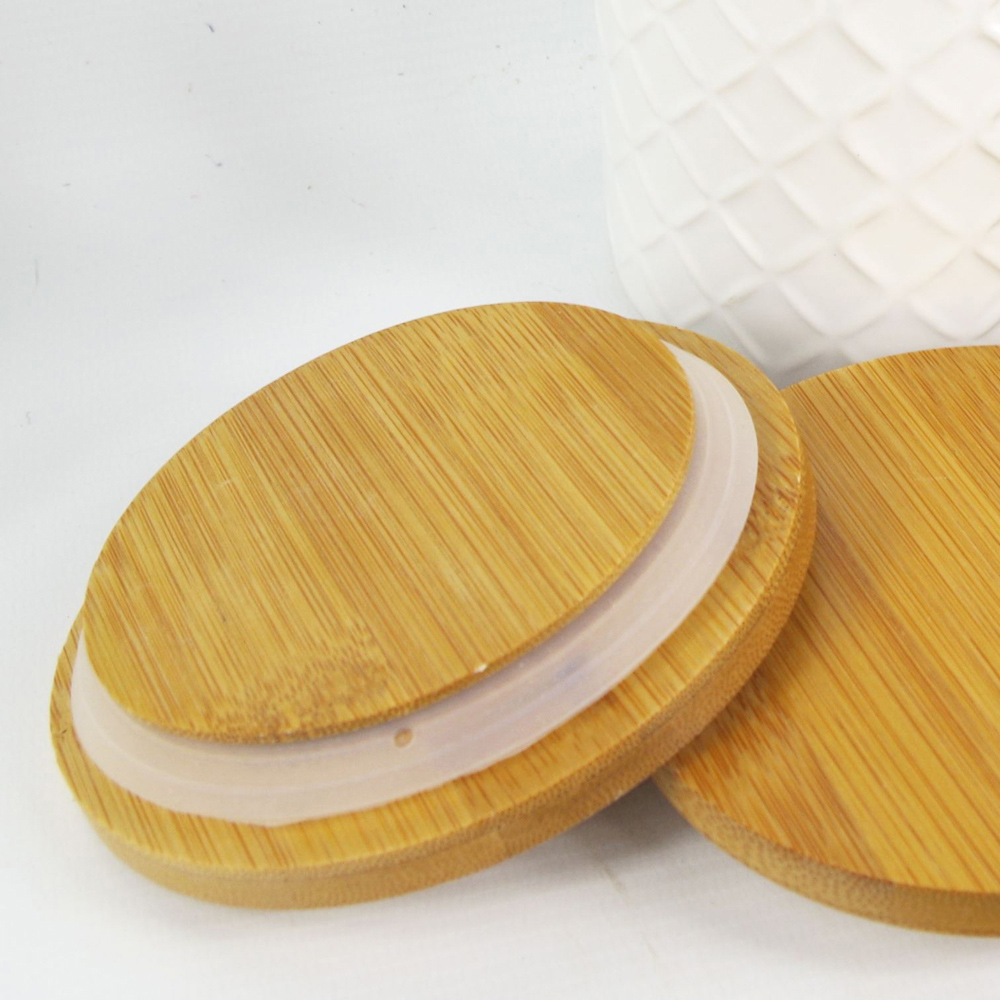 Leaf Set of 2 Embossed Cream Ceramic Jar with Bamboo Lid Image 2