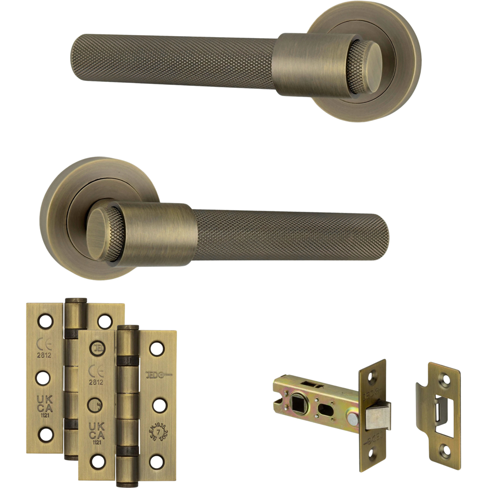 AXS Hardware Dakota Antique Brass Knurled Latch Door Handle on Rose Image 1