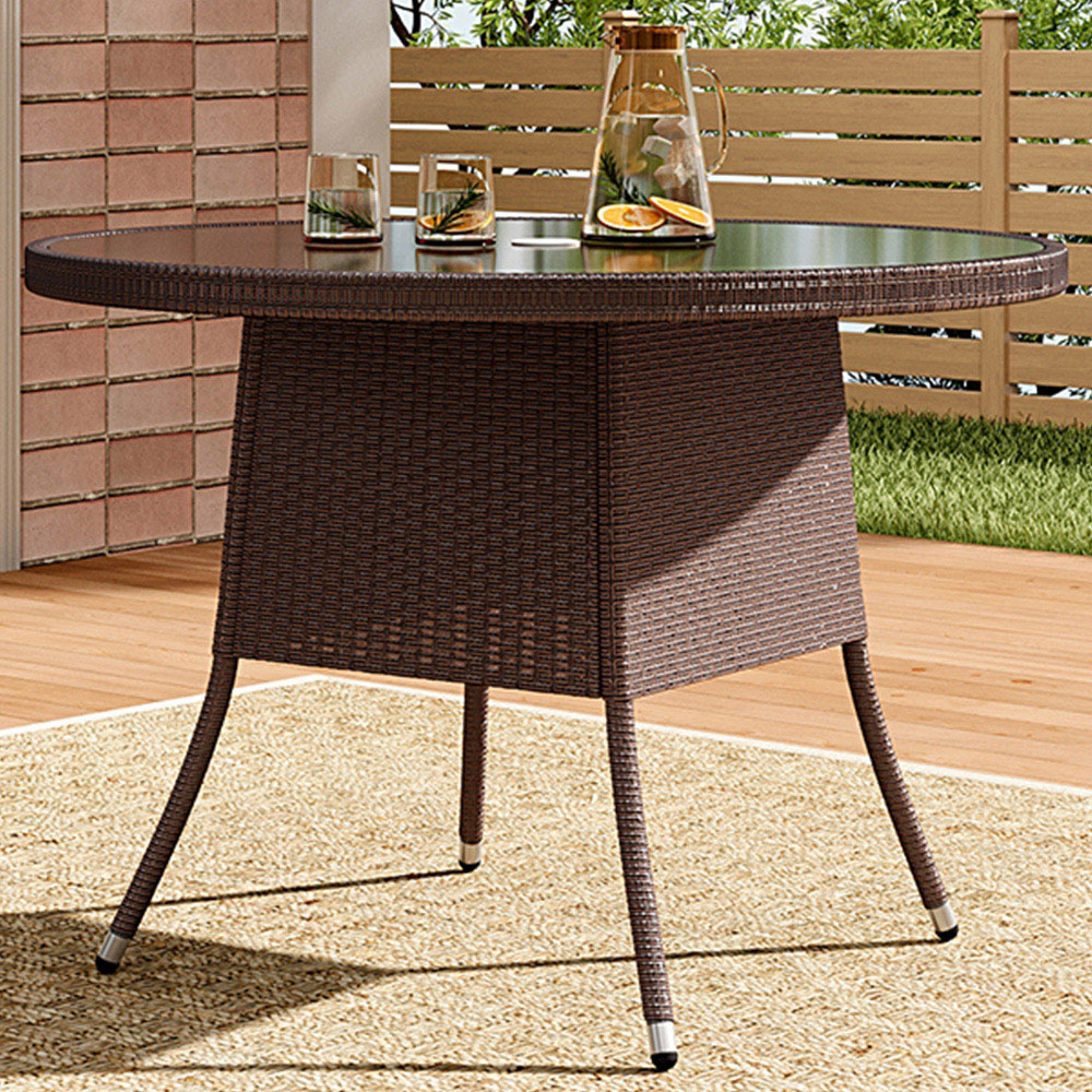 Living and Home Rattan Glass 4 Seater Round Garden Dining Table Brown Image 1