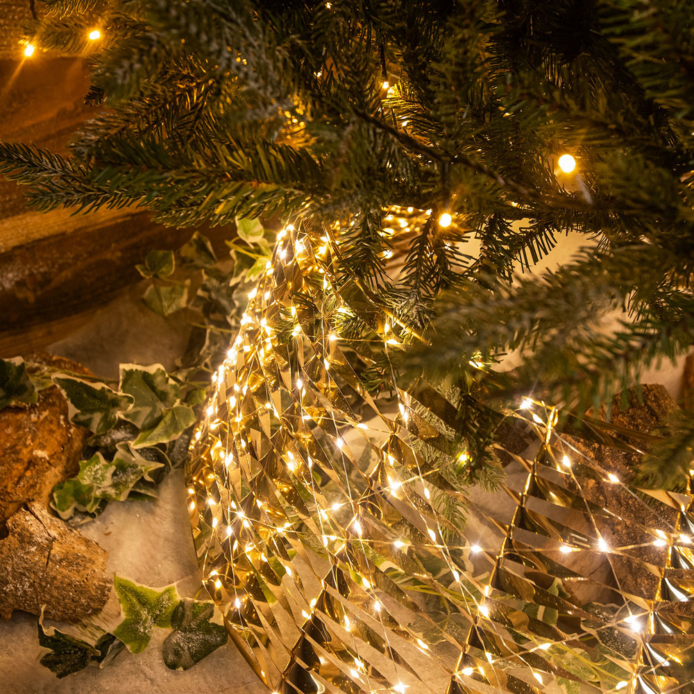 The Christmas Centre 600 Warm White LED Micro Lights Pre-Lit Gold Laser Tree Skirt 71cm Image 3