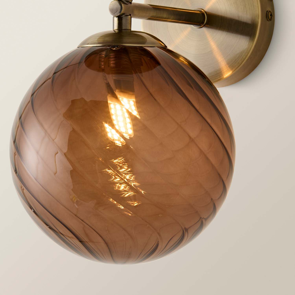 ValueLights Sydney Brushed Brass 2-Way Glass Globe Wall Light with Bulb Image 3